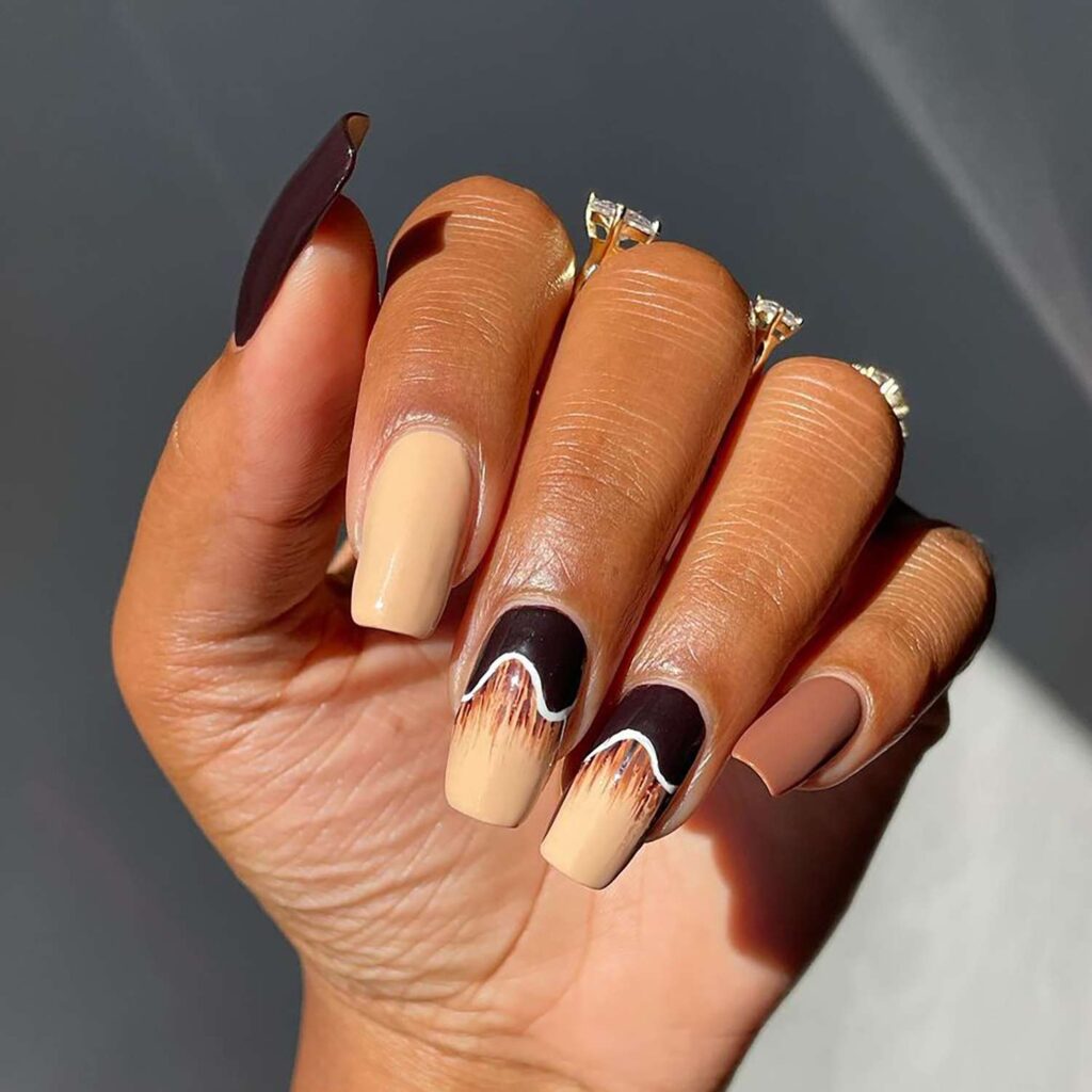 Gradient manicure blending espresso brown into creamy beige for a soft ombré coffee-inspired effect.