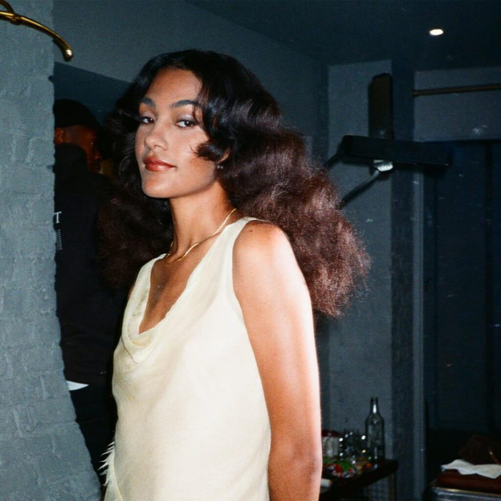 Model with Refined Tone Blonde hair featuring soft beige highlights