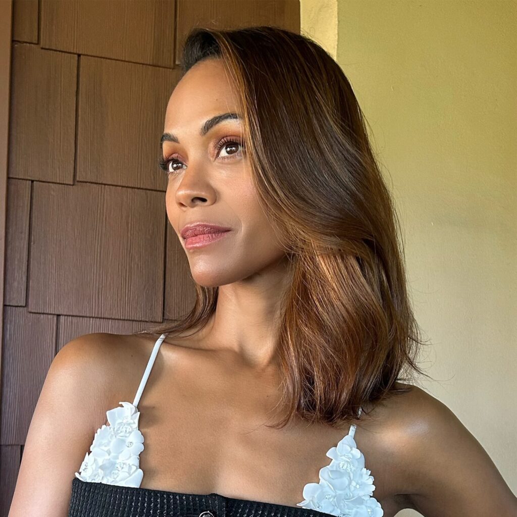 Chic straight hairstyle featuring neutral refined blonde tones