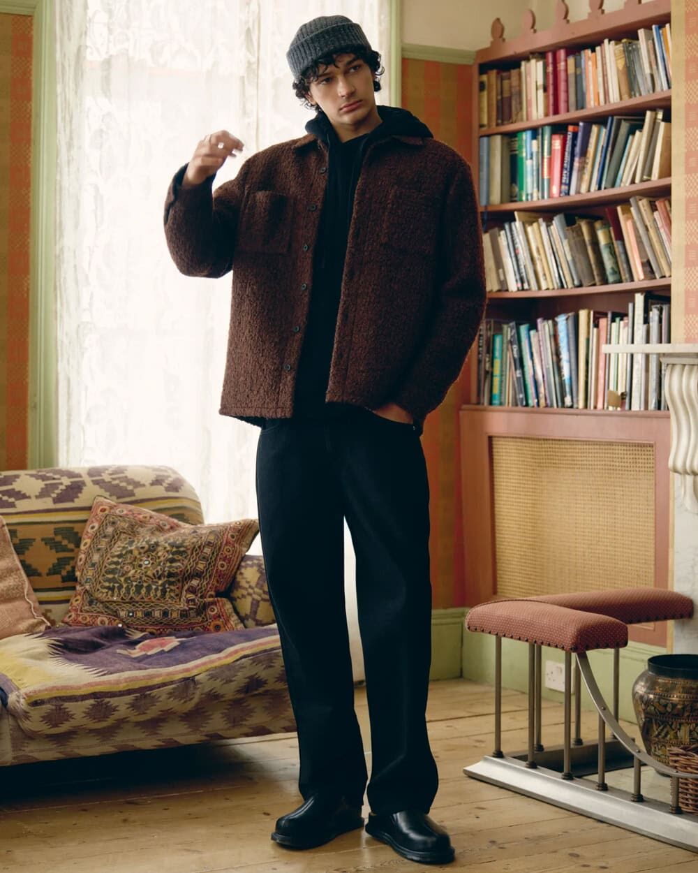 man wearing brown wool overshirt with chinos and boots in fall street style