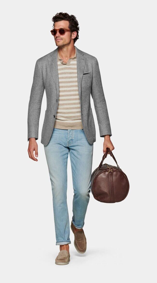  man wearing cedar wool blazer with striped shirt and slim trousers