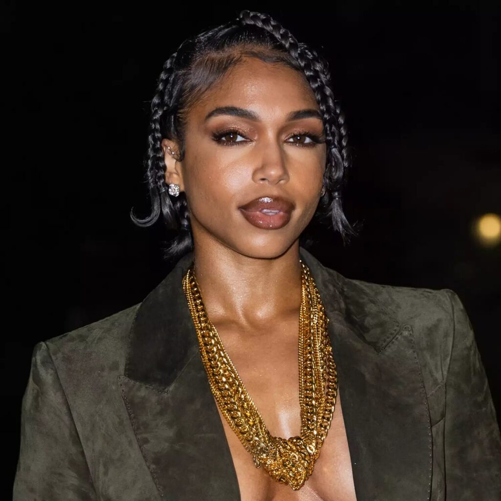 Lori Harvey wearing short knotless braids with flipped ends and styled baby hair