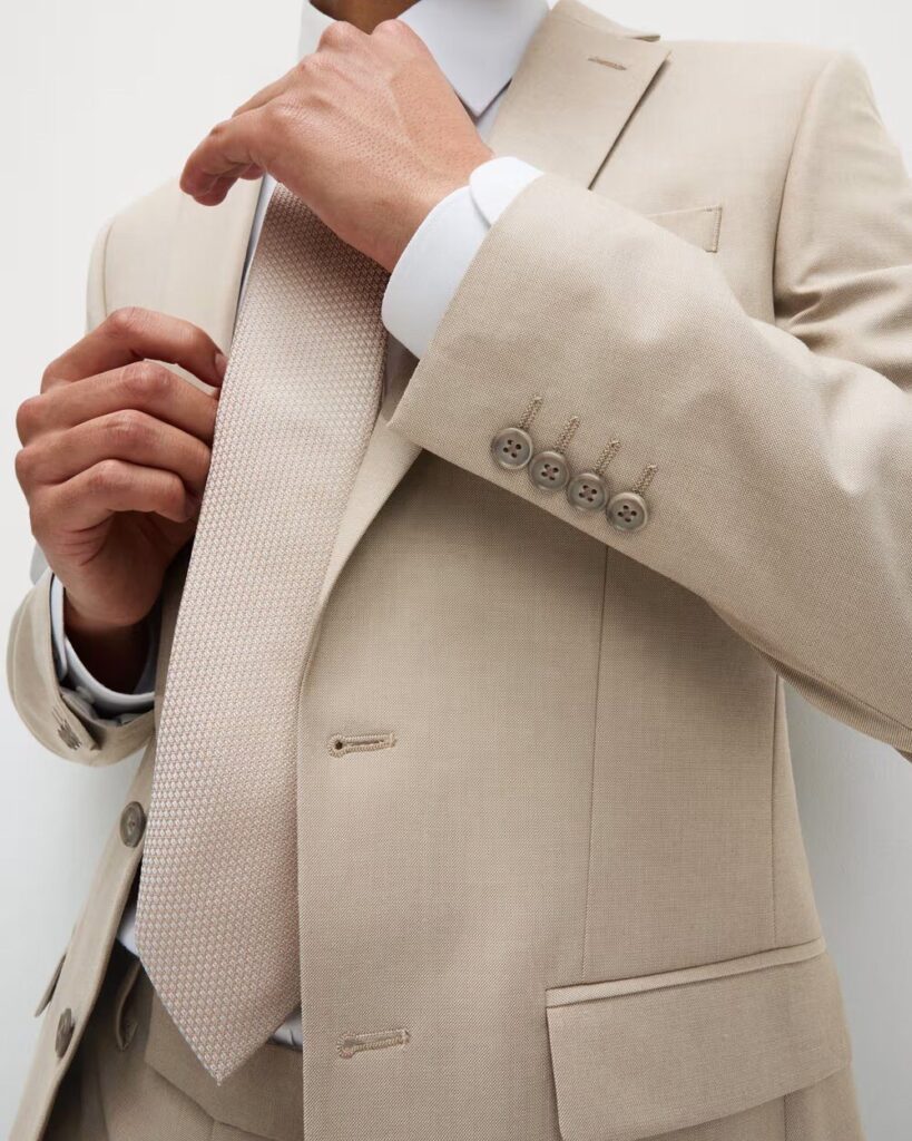 Man in Marks & Spencer tailored fit wool rich gray suit, perfect for business meetings and professional events.