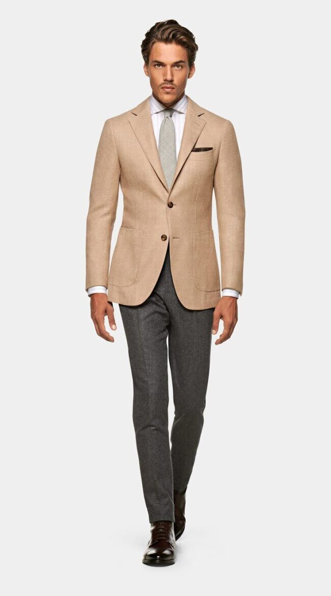 man in sepia blazer with cotton shirt and leather brogues
