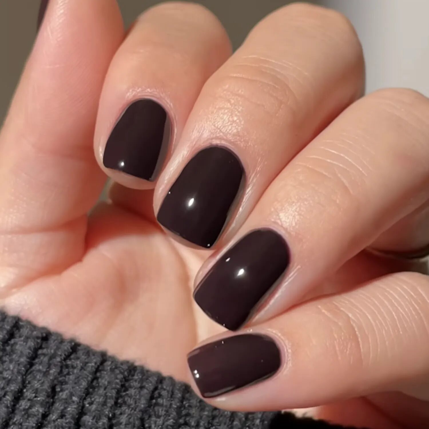 Dark plum manicure inspired by velvet and boucle textures for fall