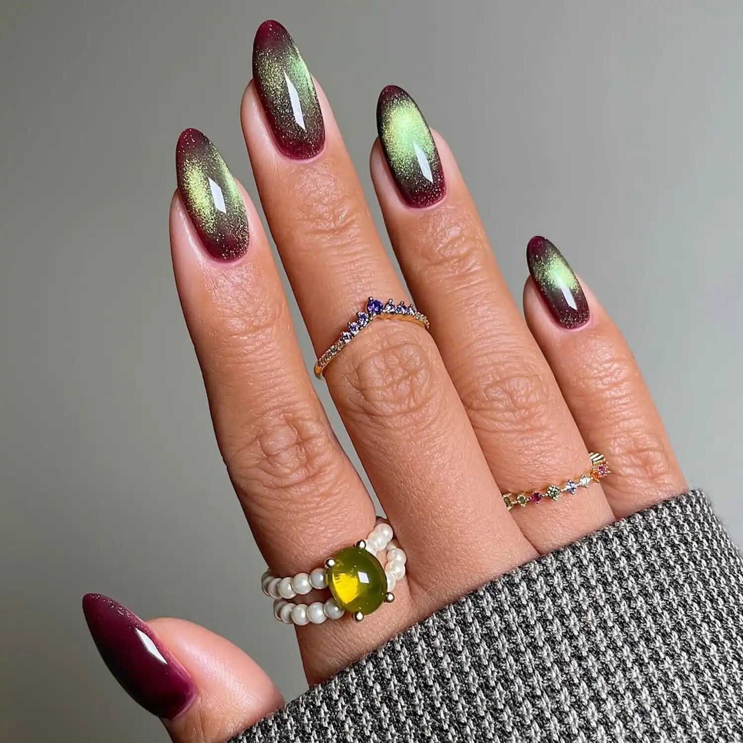 Plum and sage velvet glass nails with shifting tones and magical moody shimmer.