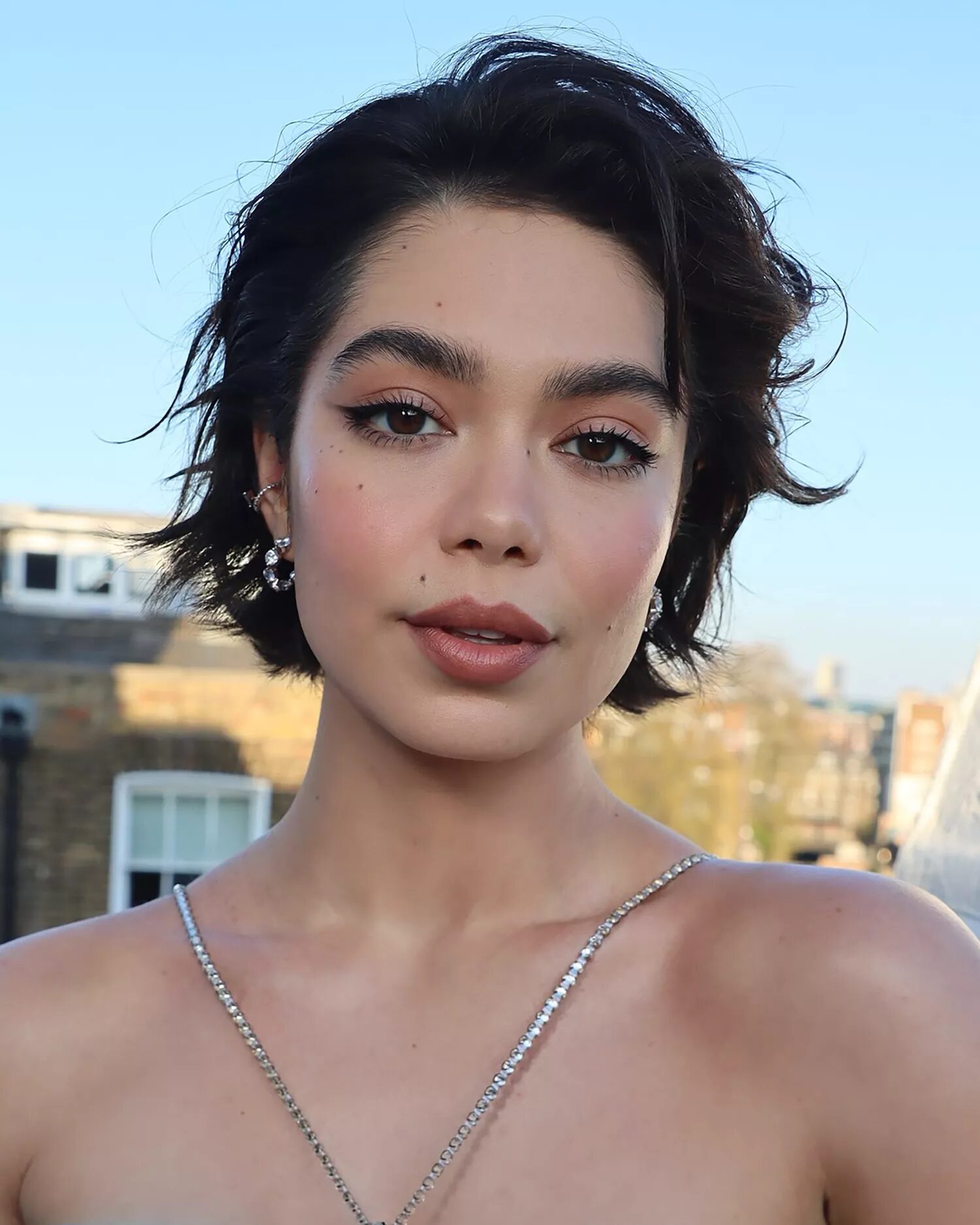 Chic short haircut featuring a soft bob and textured lob for a low-maintenance summer look.