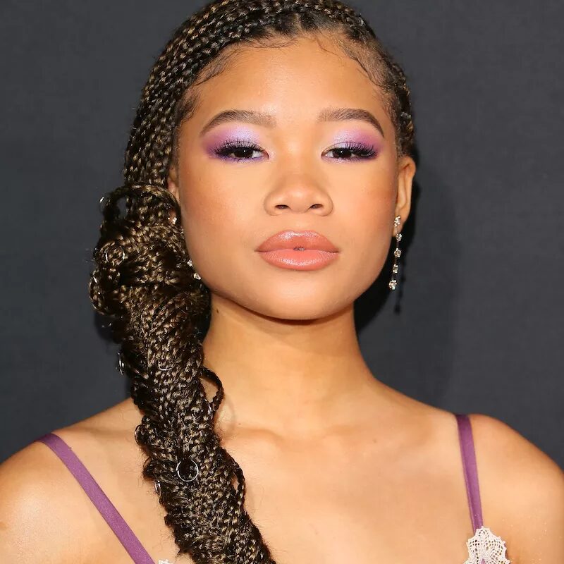 Romantic fishtail braid featuring a symmetrical, intricate weave.