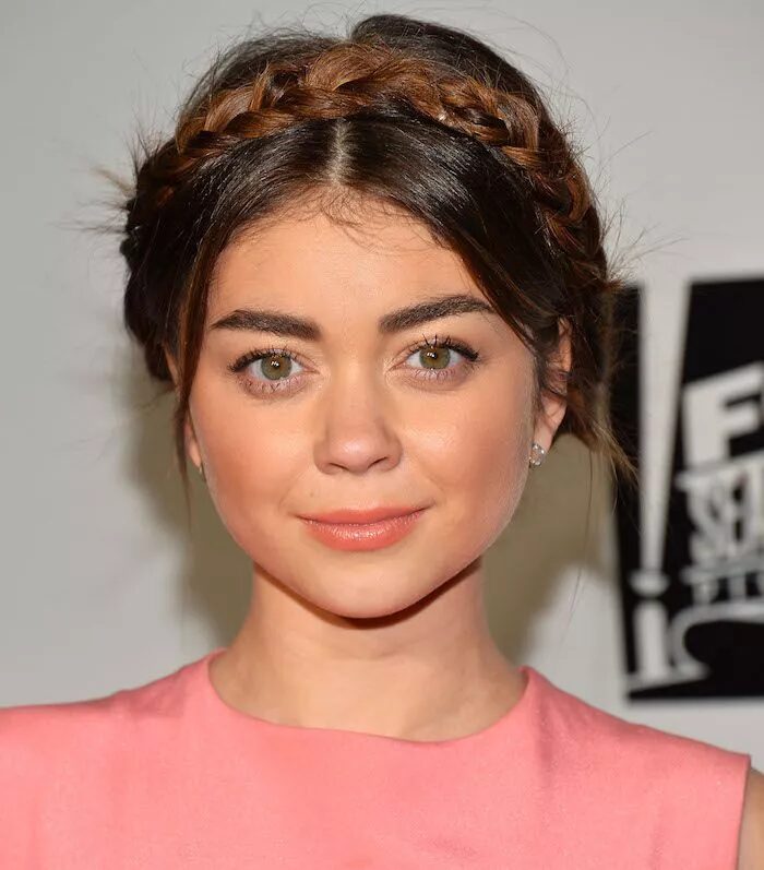 Vintage milkmaid braid with a neat, centered part and soft finish.