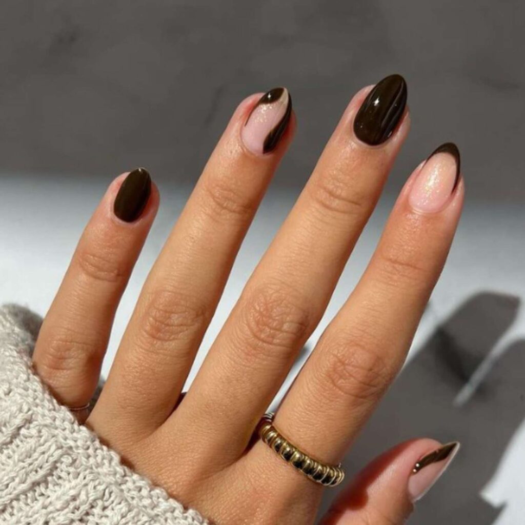 Matte espresso nails with a velvety finish, paired with cozy autumn accessories like scarves or mugs.