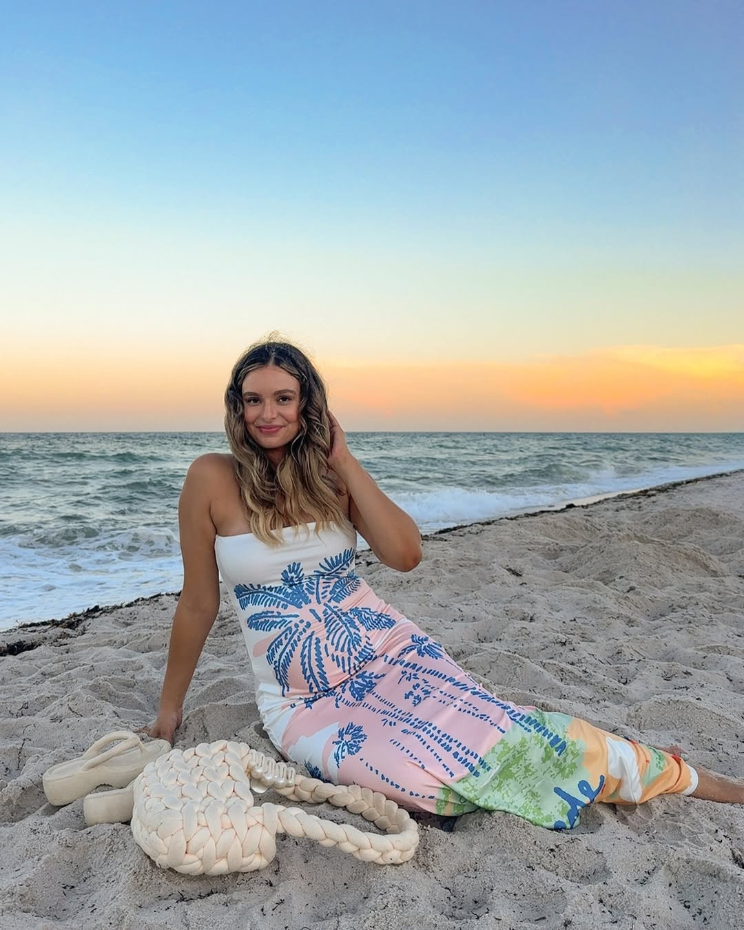 A relaxed strapless maxi dress in soft colors for a beachy vibe.