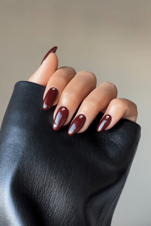 Dark wine nails with pearl accents