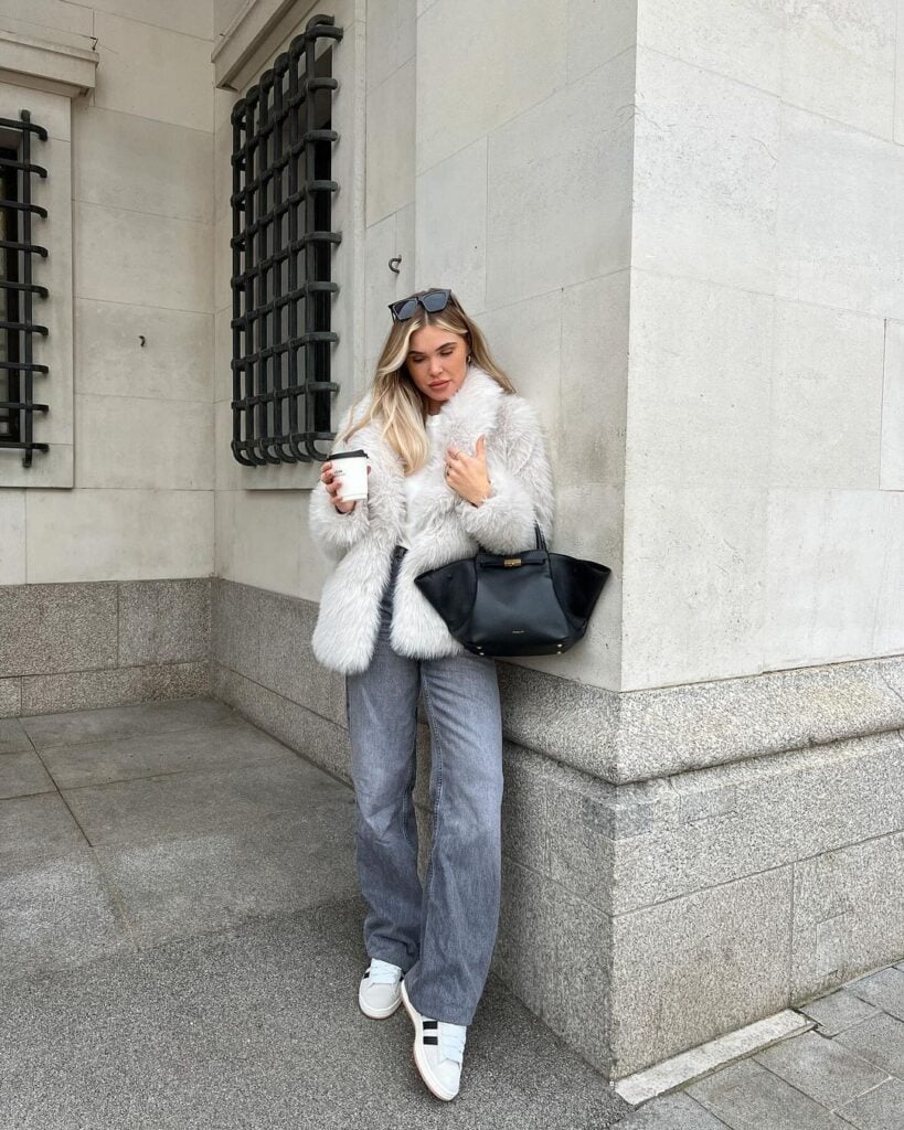 Woman in camel-toned layers with clean basics, demonstrating casual city chic.