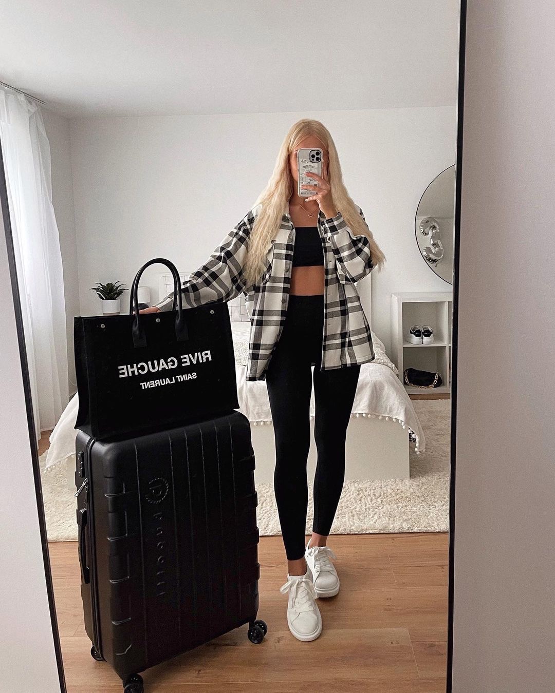 Clean lines and quiet confidence in an airport outfit.