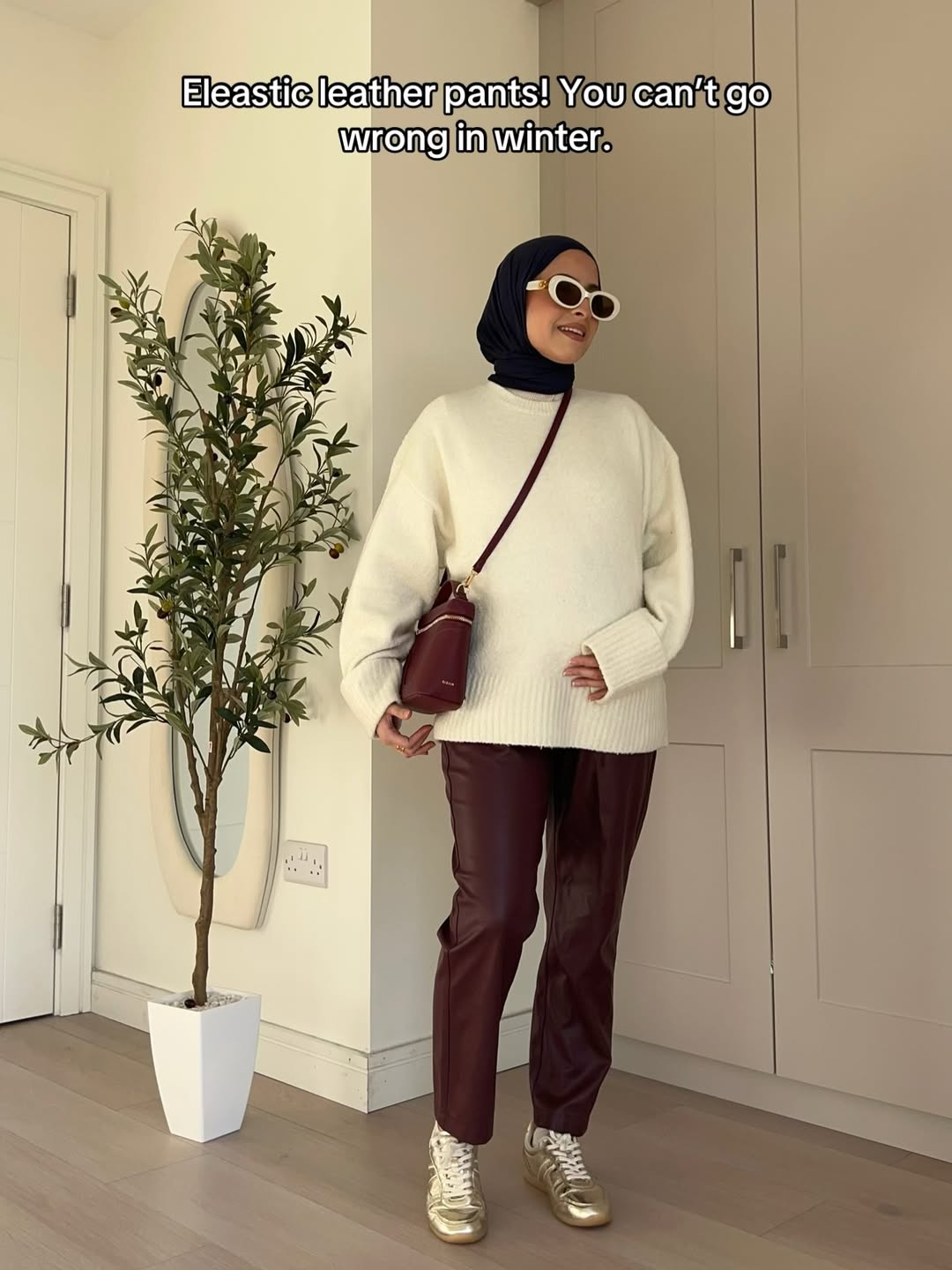 An outfit that balances cozy comfort with bold, statement pieces.