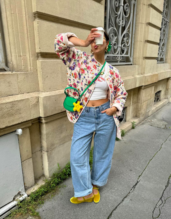 Soft pink tones combined with relaxed denim.