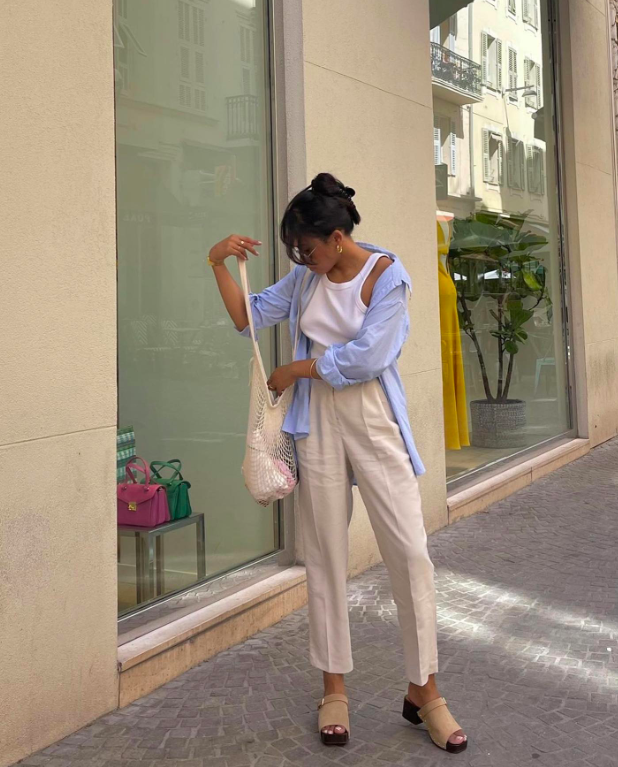 Soft layers in neutral tones with relaxed denim.