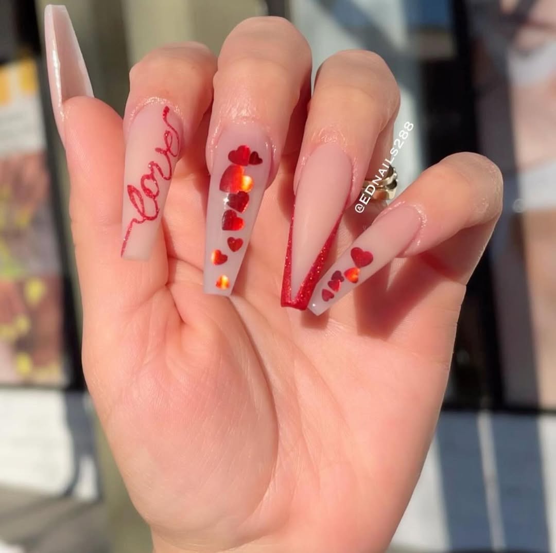 Coffin-shaped nails with heart details and subtle lettering