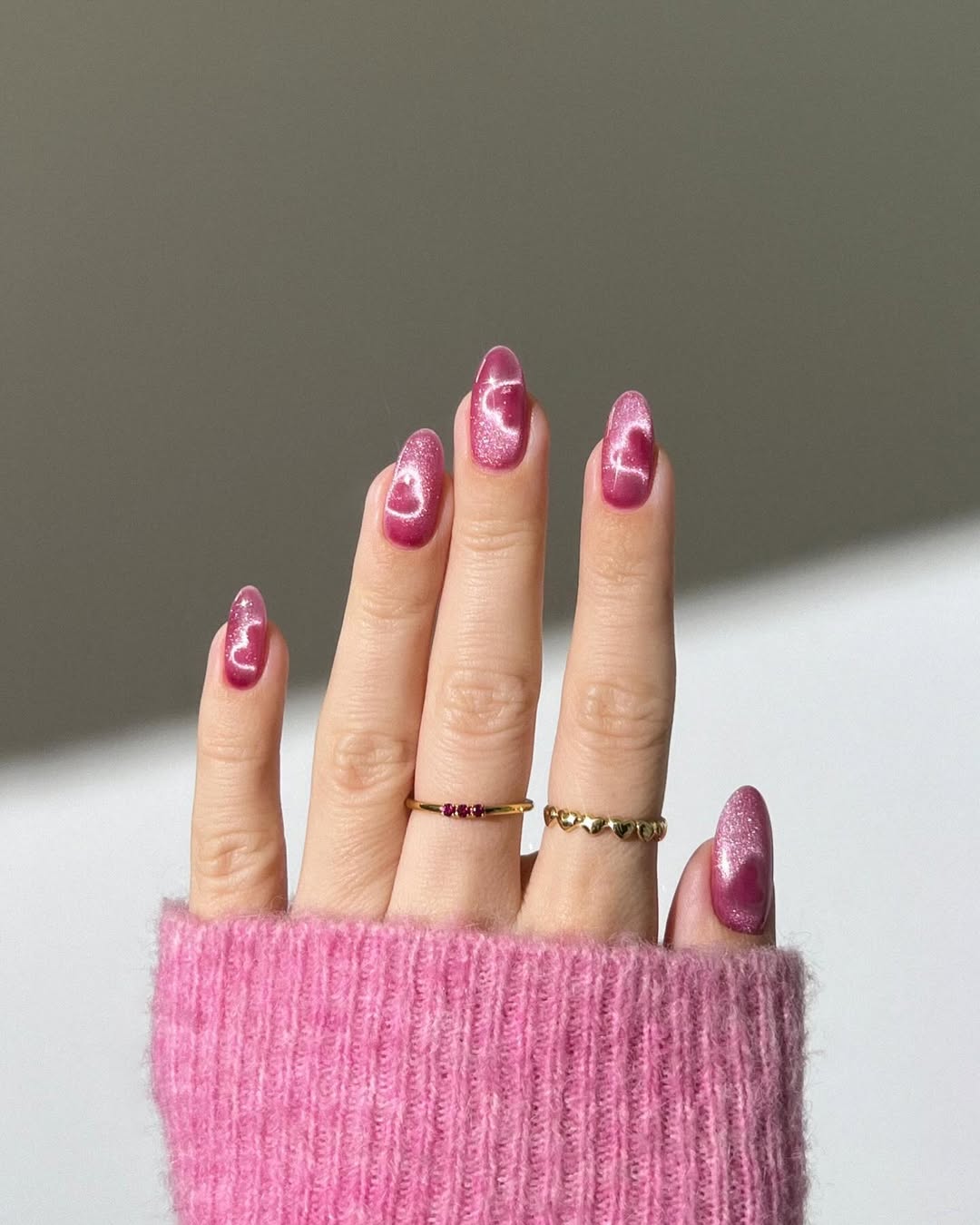 French tip nails with pink edges and heart details