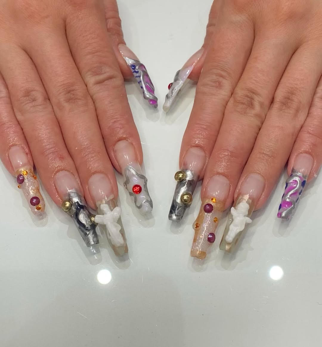 Decorative long nails with embellishments