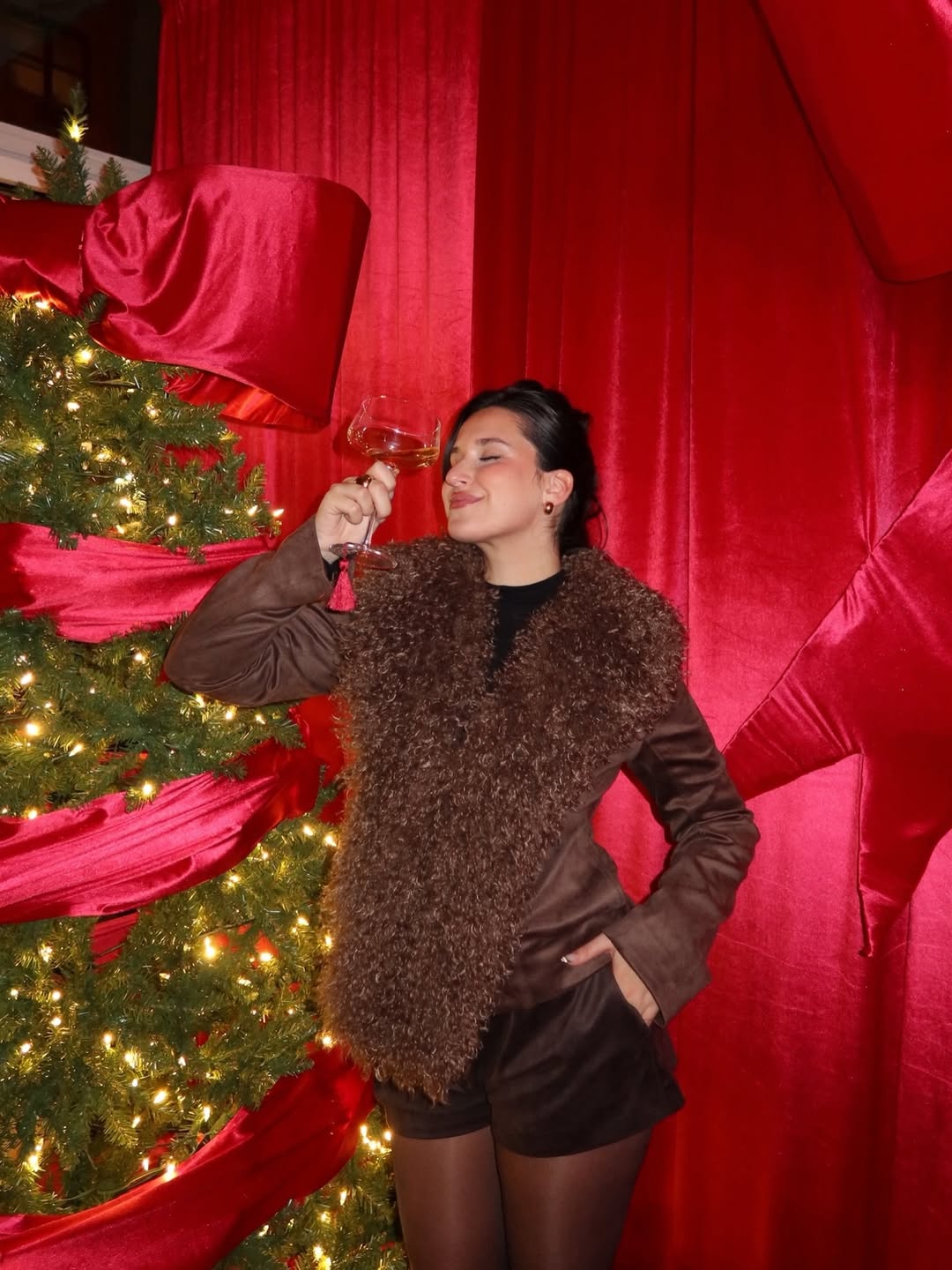 A rich-toned velvet outfit for a cozy evening.