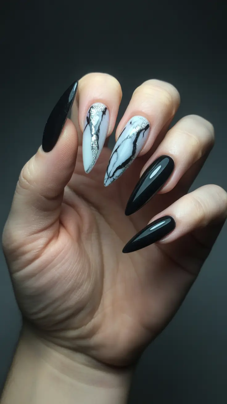 Black and white marble nails with silver detail