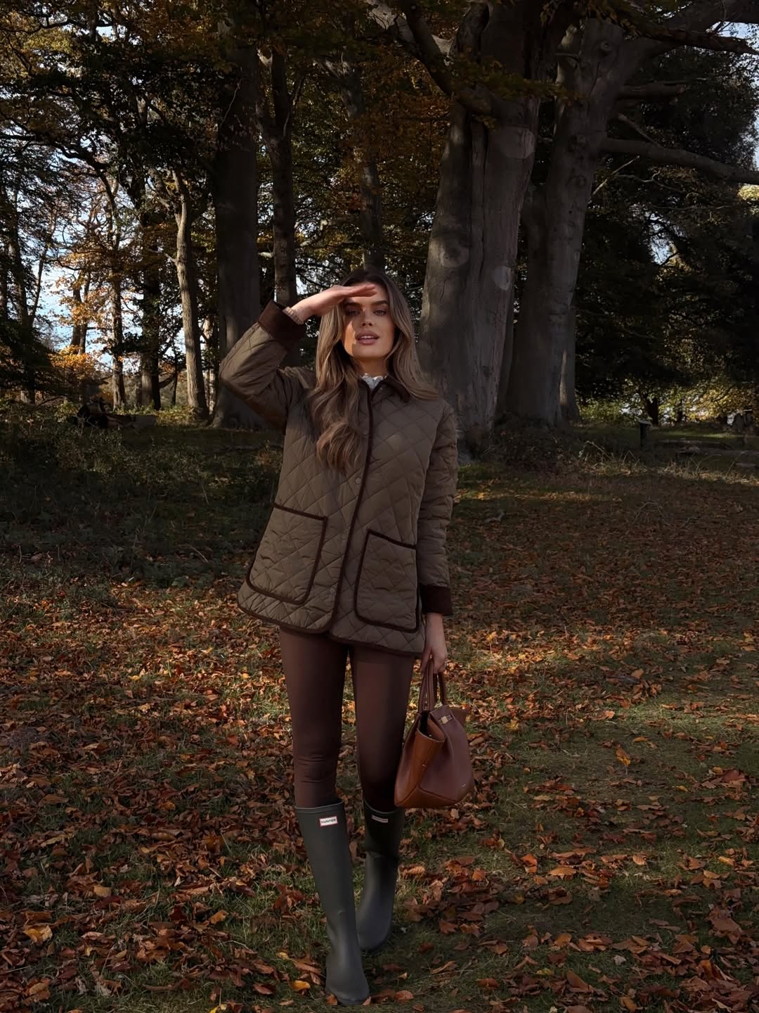 Quilted jacket, riding leggings, and hunter boots
