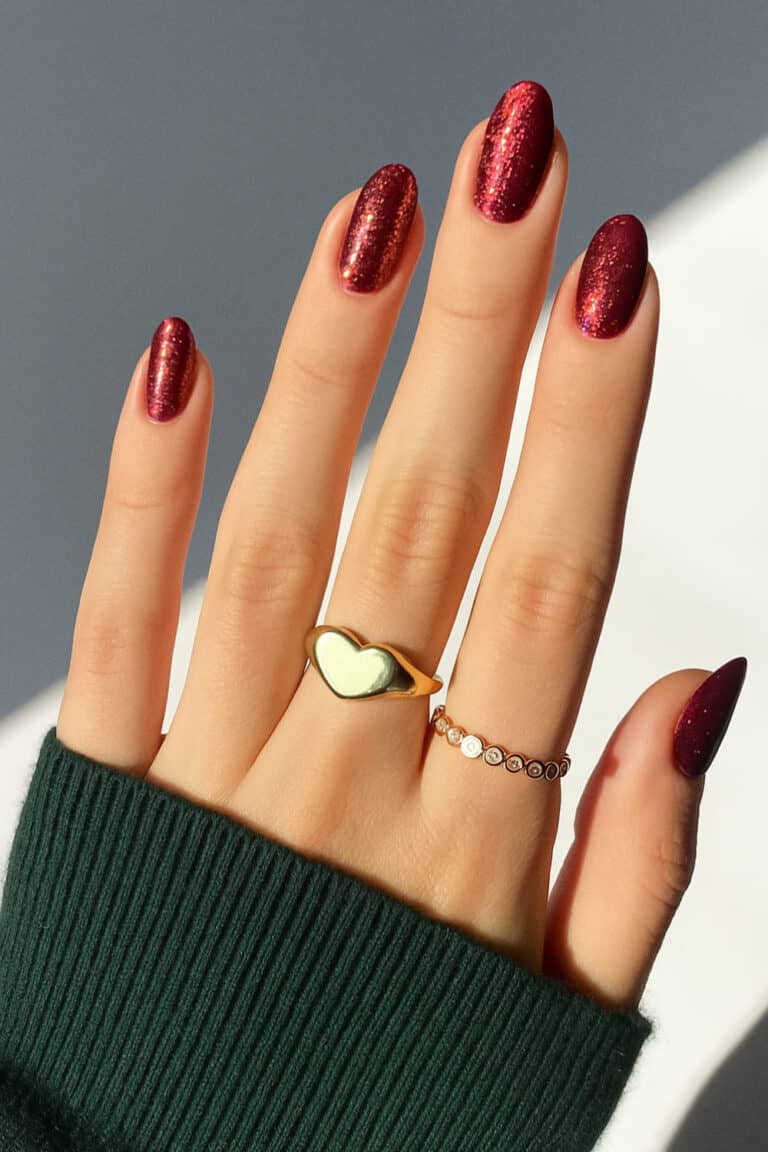 Glossy deep red shimmer nails perfect for date night