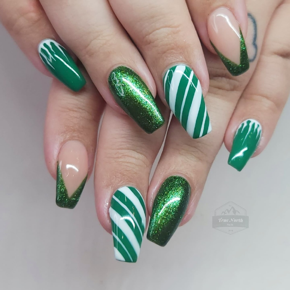 1. Enchanting Emerald Glamour with Festive Flair
