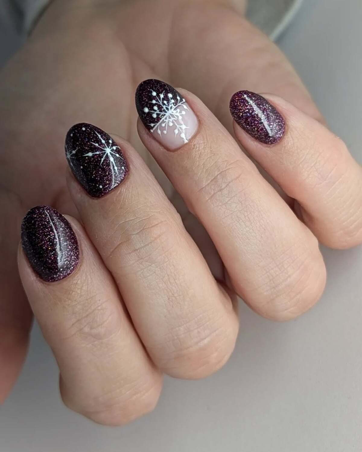 2. Sparkling Burgundy Snowflakes for a Frosty Night