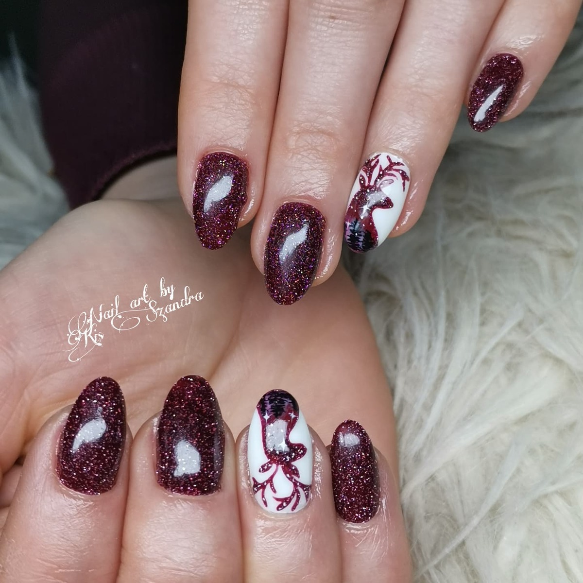 24. Sparkling Burgundy Reindeer with Winter Glow