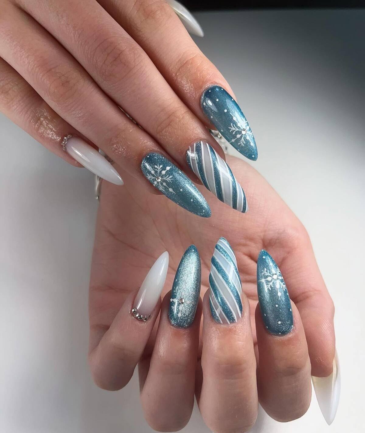 2. Icy Blue Elegance with Snowflake Accents