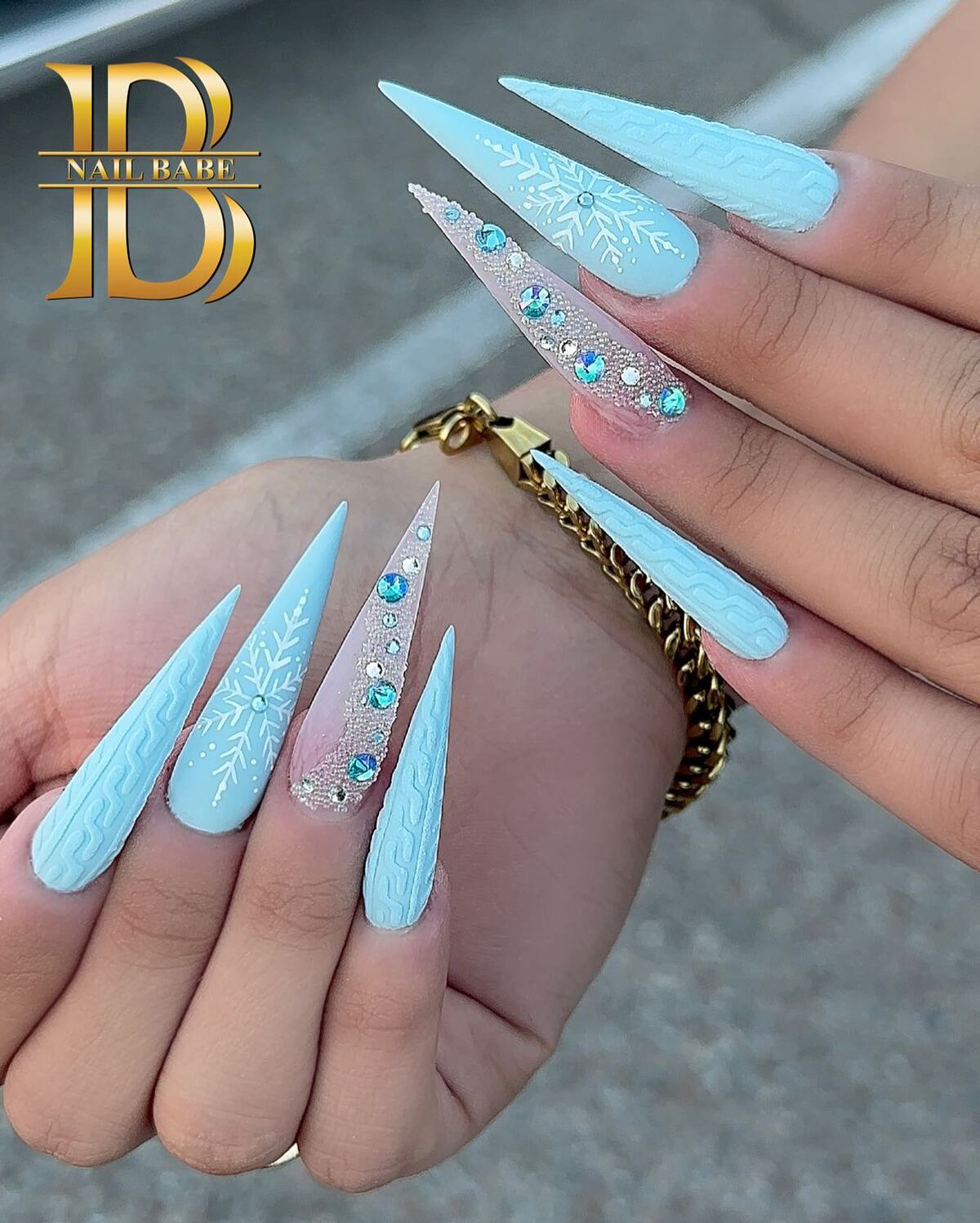 21. Arctic Blue Glam with Rhinestone Accents