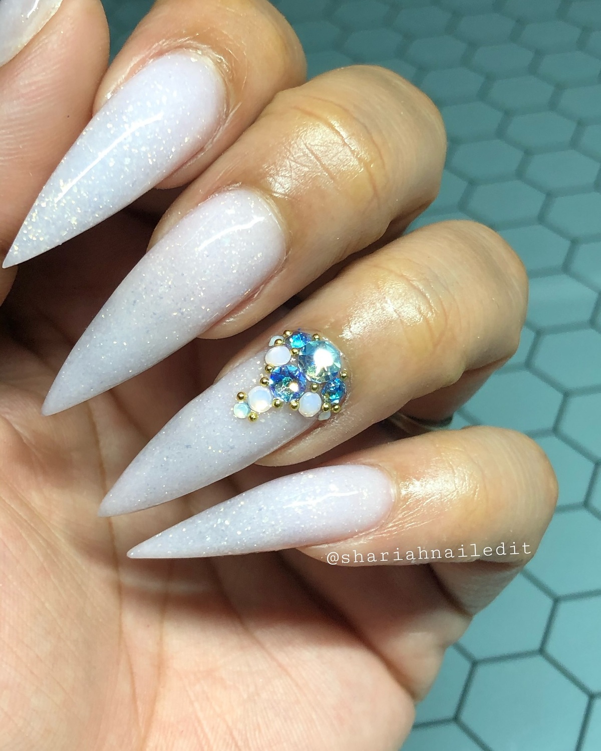 9. Icy Glow with Crystal Embellishments