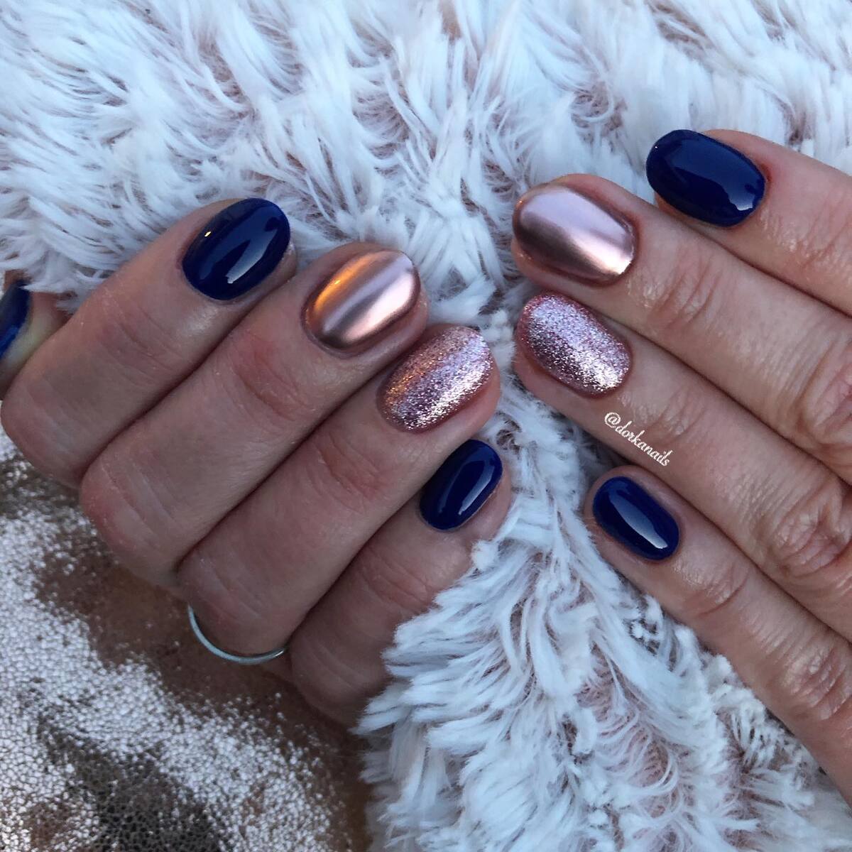 1. Midnight Blue and Rose Gold Elegance