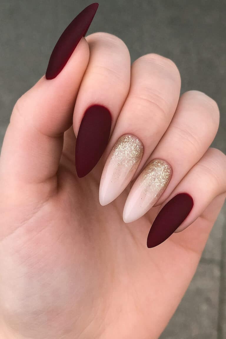 Matte deep red nails with gold sparkle accent nails