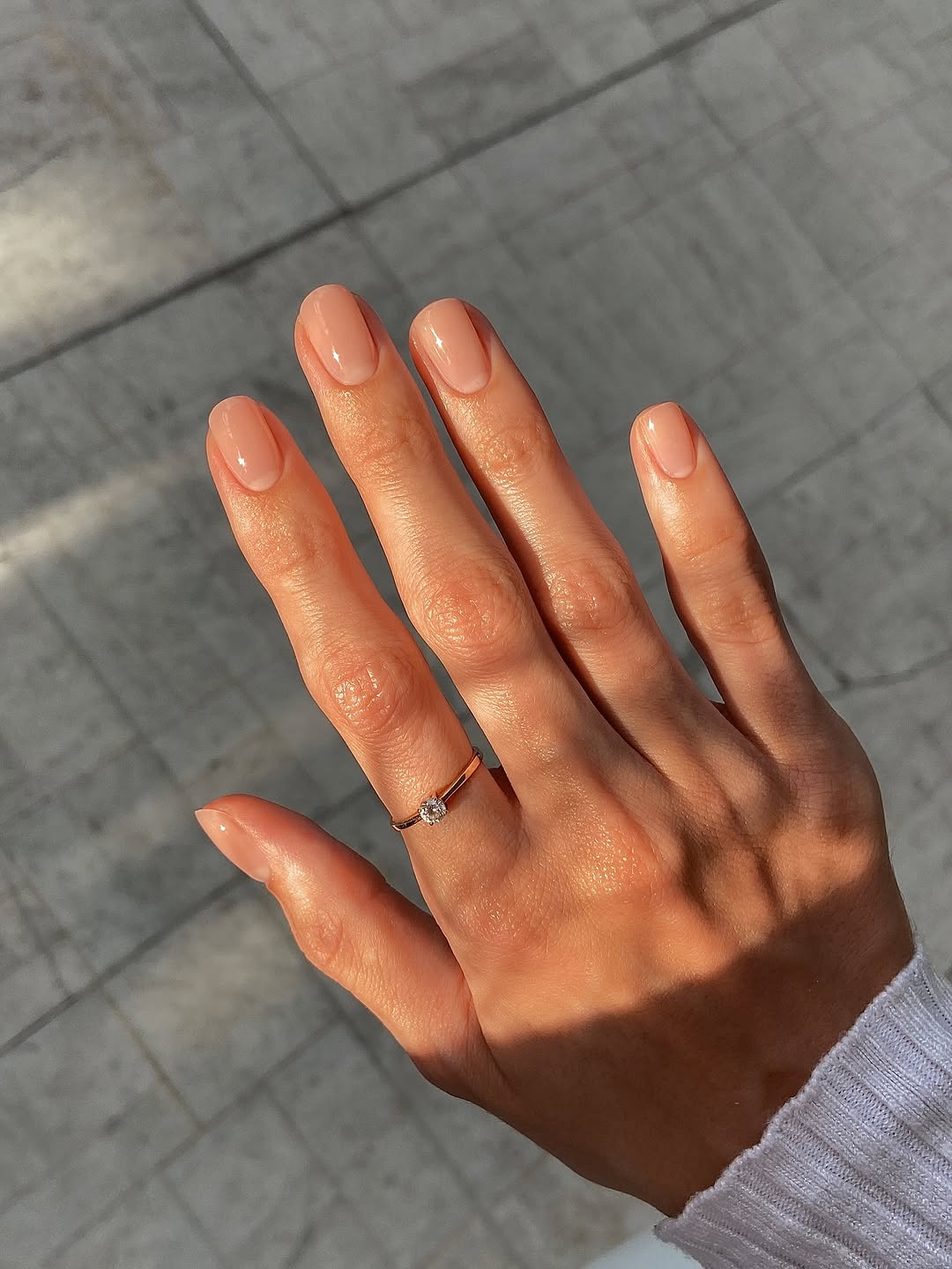 Creamy nude nails with a glossy finish