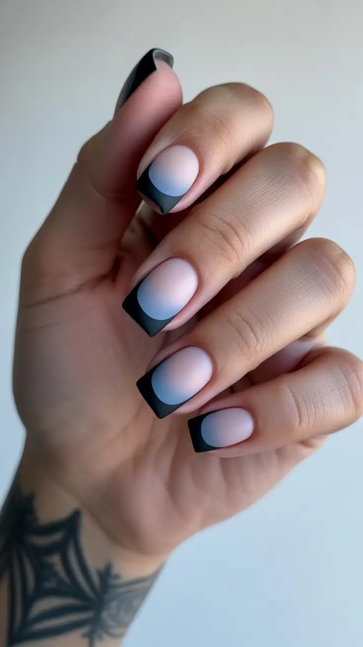 Frosted gradient square nails with sharp black tips.