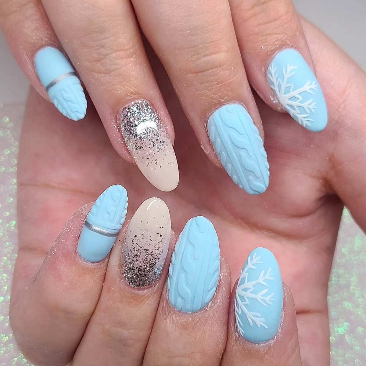 25. Cozy Knit and Snowflake Charm