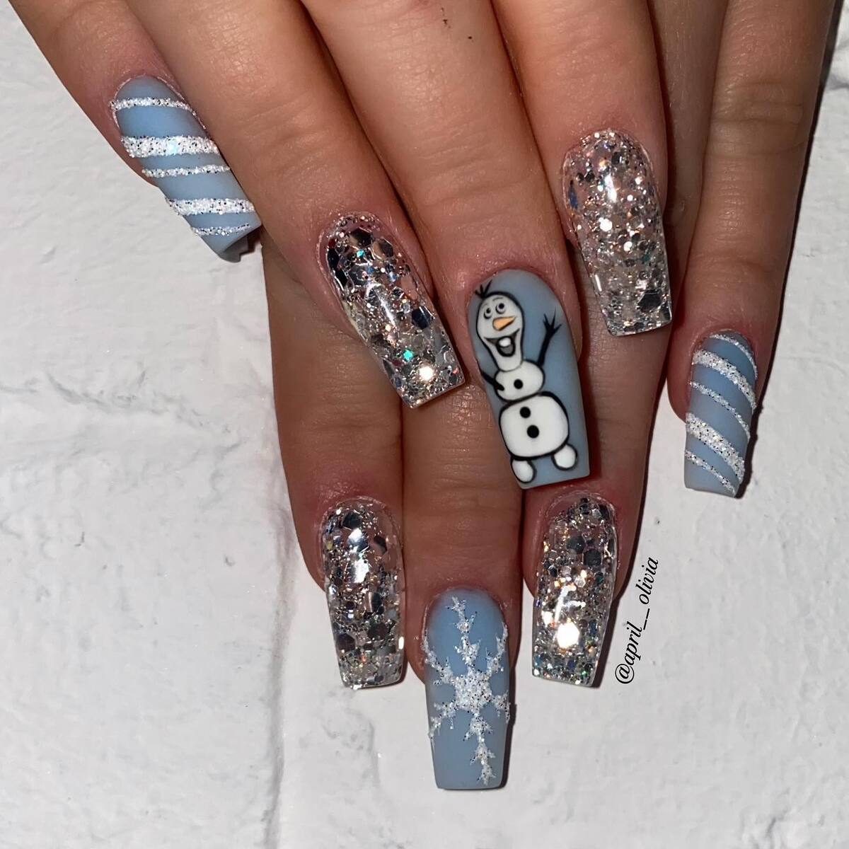 8. Playful Snowman Sparkle