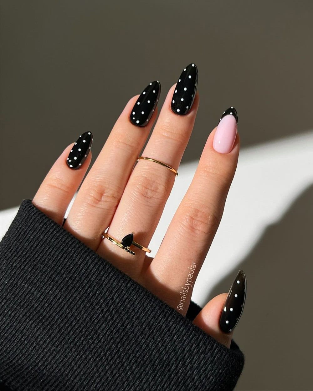 Short, chic nails in a deep black shade