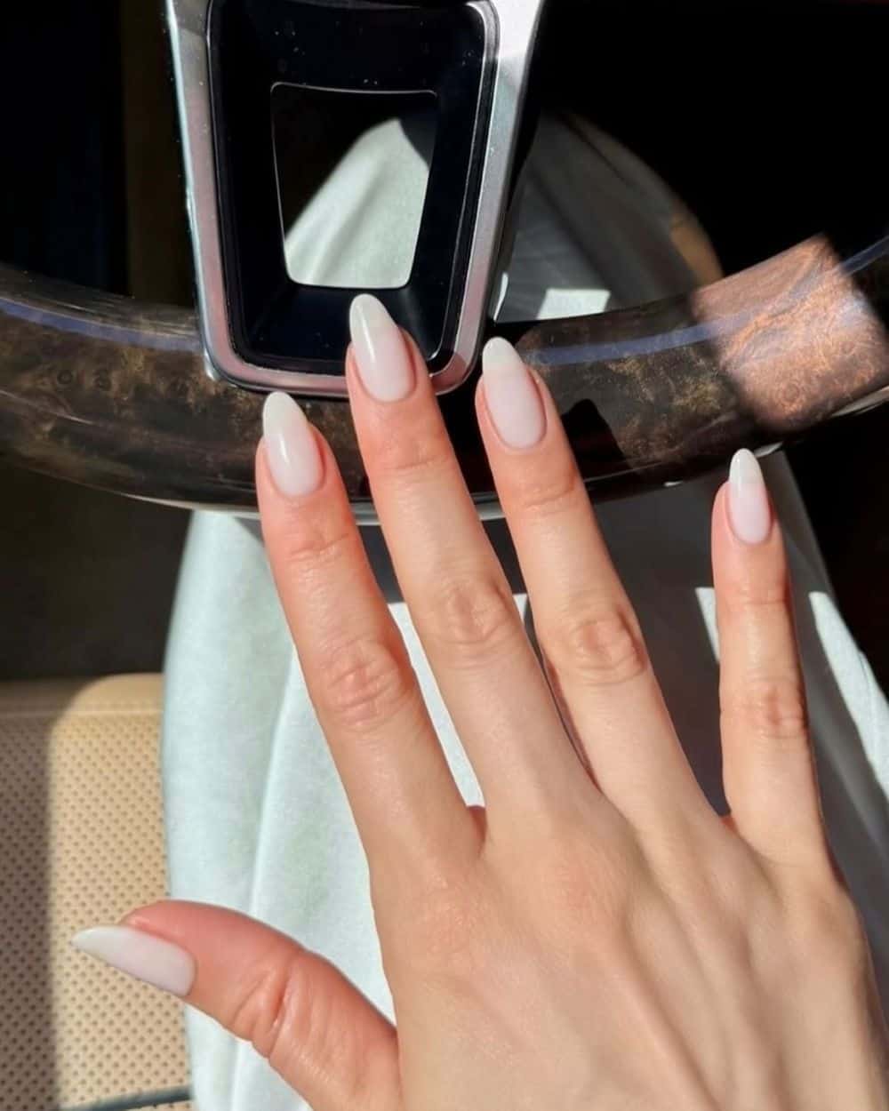 A French manicure featuring Cloud Dancer white tips