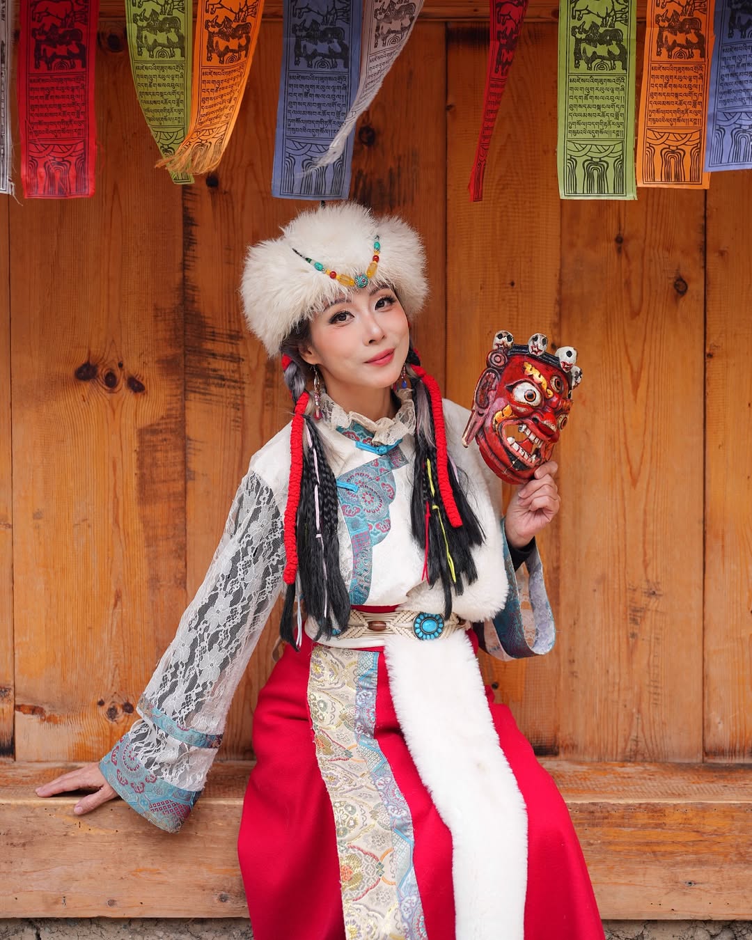 A dress with intricate artistic details that convey a sense of cultural heritage and storytelling.