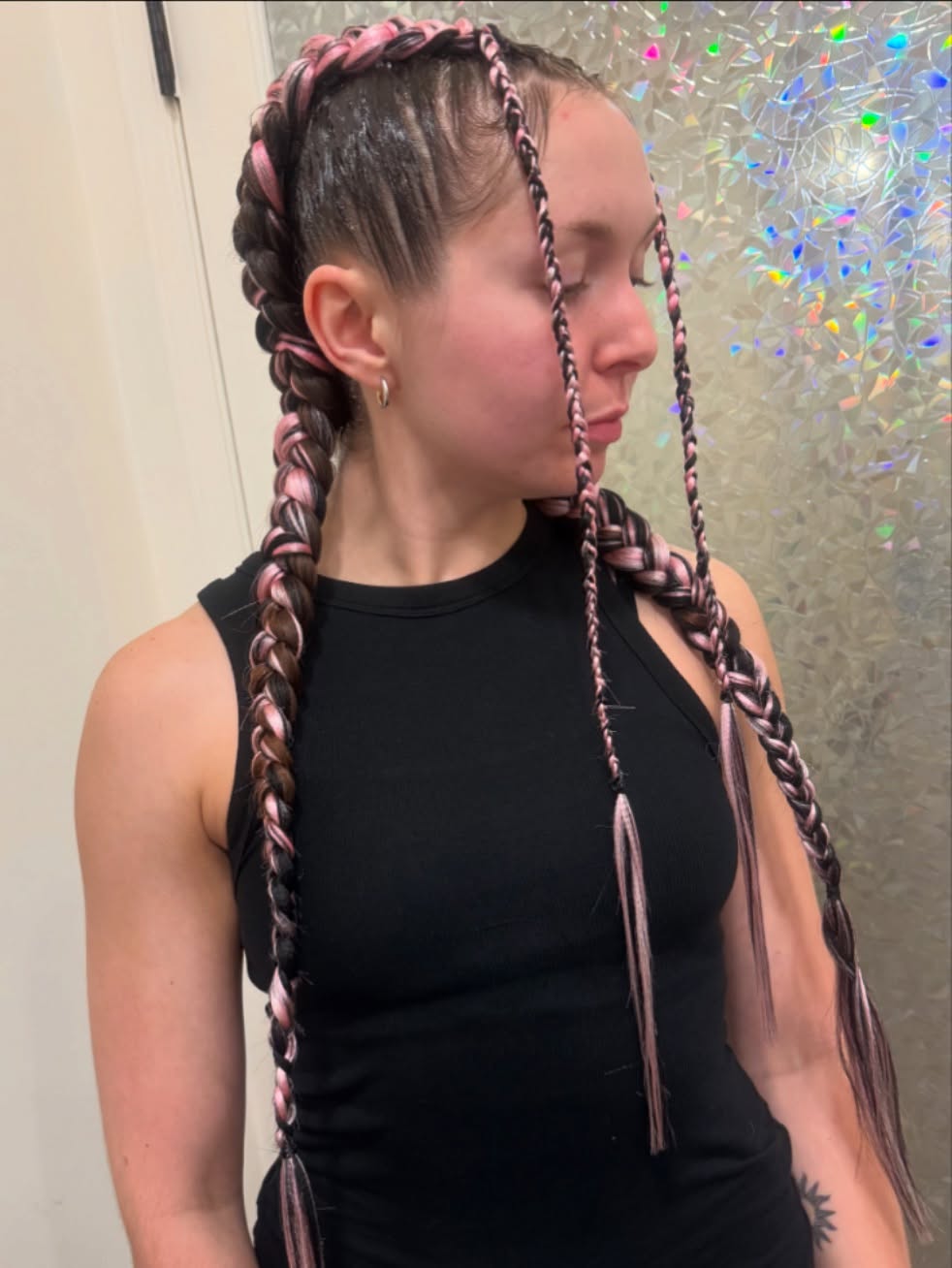 A hairstyle featuring braided accents