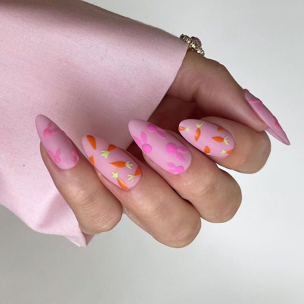 Pastel nails with bunny shapes and garden-inspired accents.