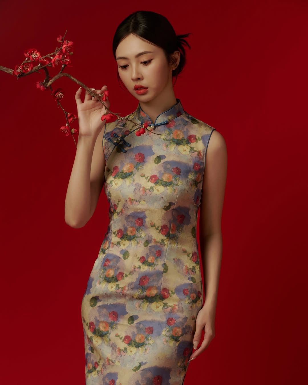 A dress with clean lines and a traditional neckline, representing a timeless and classic style updated for contemporary fashion.