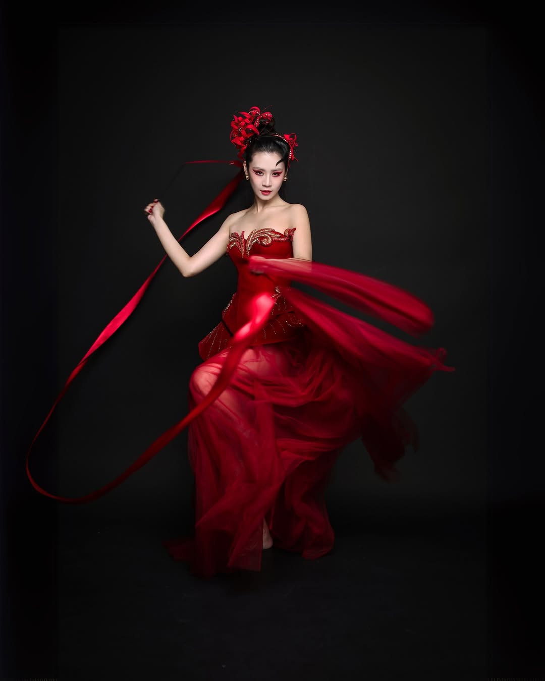 A family dressed in matching red outfits, radiating warmth and joyful celebration for Lunar New Year.