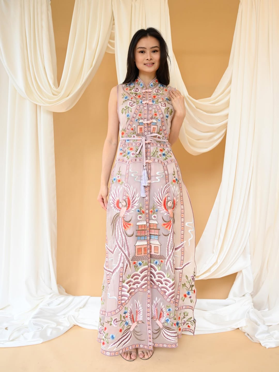 An intricately detailed and luxurious dress that evokes high fashion couture, suitable for a grand Chinese New Year event.