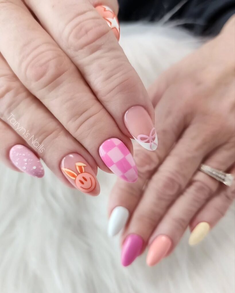 Nails with mixed elements and fun patterns for a playful, stylish look.