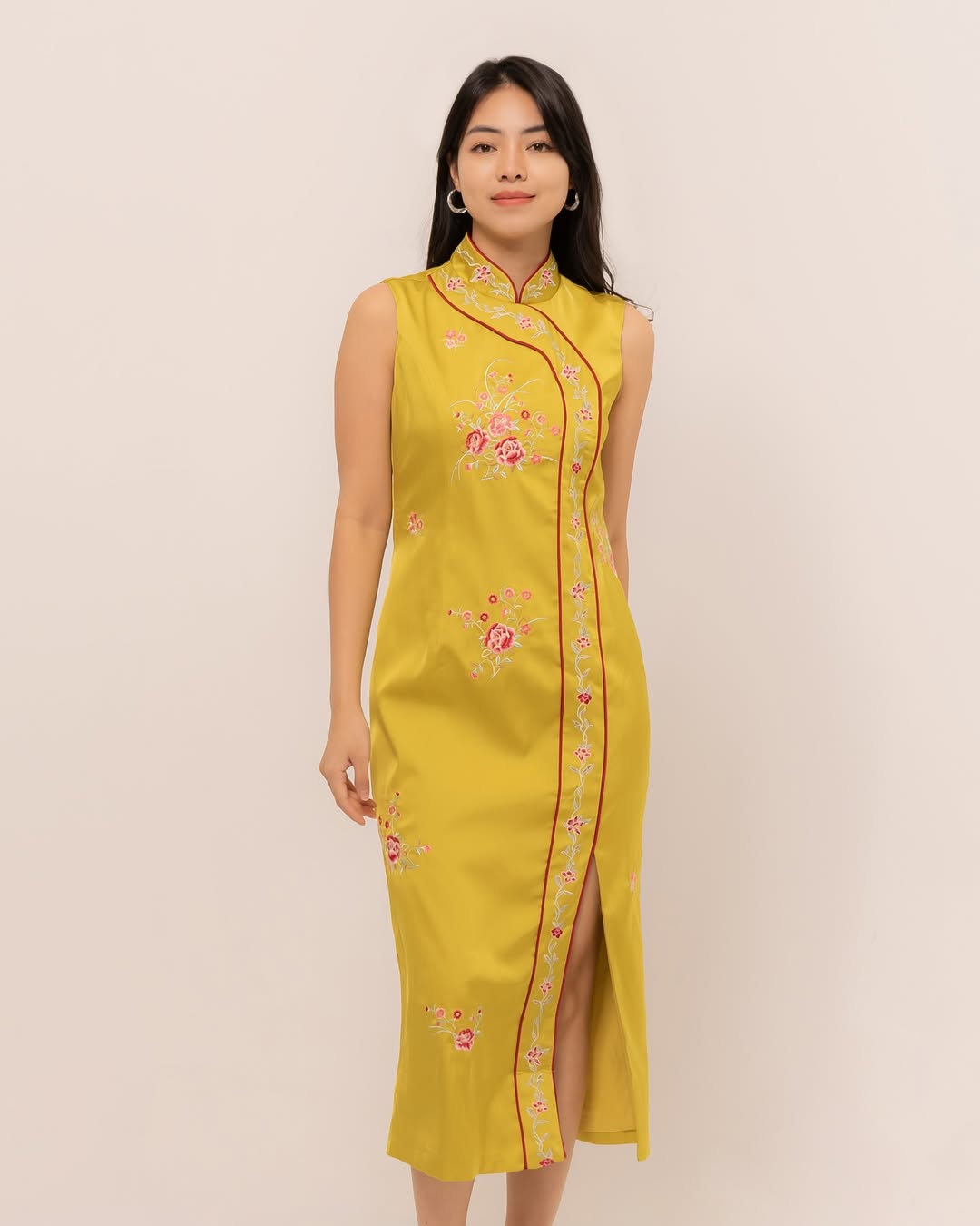 A bright yet elegant yellow qipao, symbolizing optimism, light, and fresh beginnings for Lunar New Year.